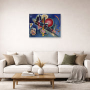 Unframed poster print of Wassily Kandinsky's Im Blau displayed on a wall in a living room