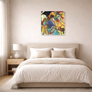 Unframed poster print of Wassily Kandinsky's Improvisation No. 30 (Cannons) displayed on a wall in a bedroom