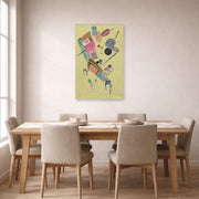 Unframed poster print of Wassily Kandinsky's Moderation displayed on a wall in a dining room