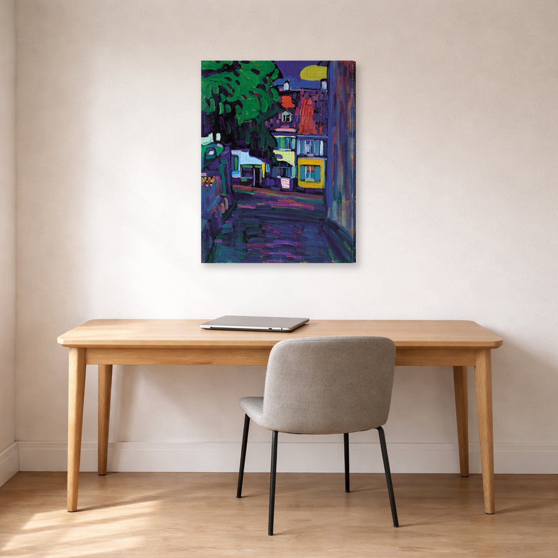 Gallery-wrapped canvas print of Wassily Kandinsky's Murnau, Houses in the Obermarkt displayed on a wall in an office