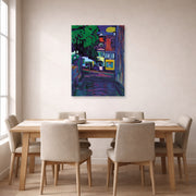 Unframed poster print of Wassily Kandinsky's Murnau, Houses in the Obermarkt displayed on a wall in a dining room