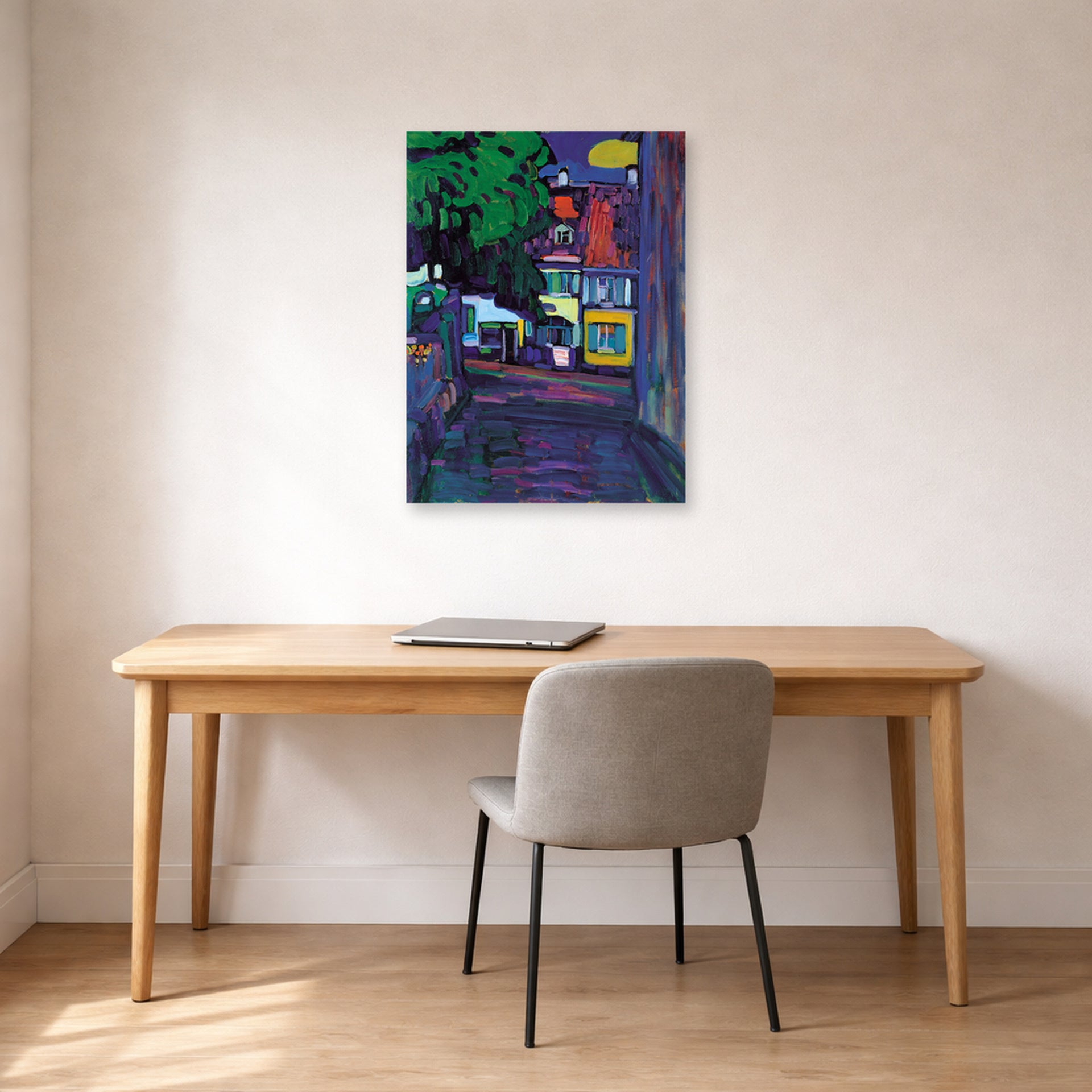 Unframed poster print of Wassily Kandinsky's Murnau, Houses in the Obermarkt displayed on a wall in an office