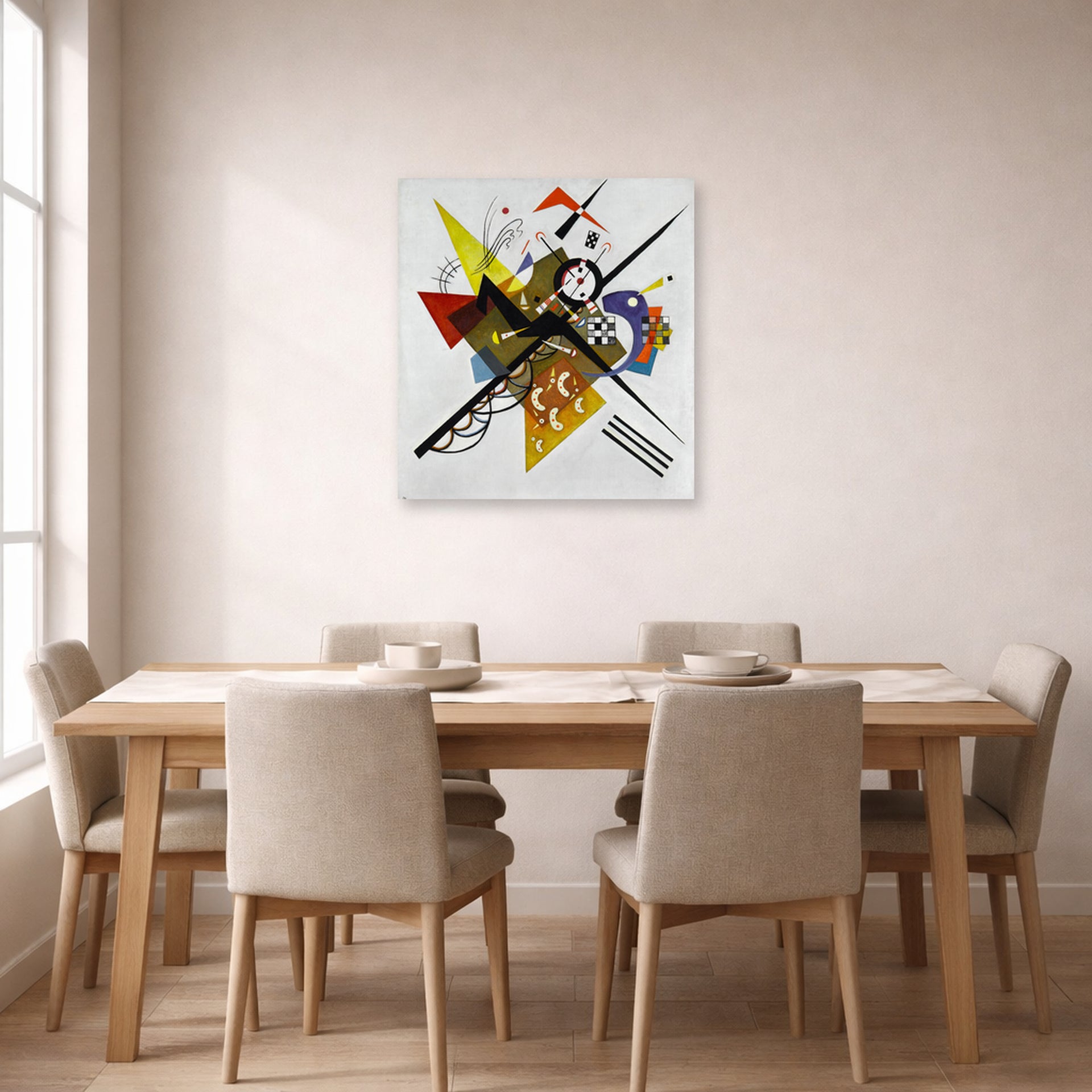 Unframed poster print of Wassily Kandinsky's On White II displayed on a wall in a dining room