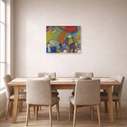 Unframed poster print of Wassily Kandinsky's Strandenze displayed on a wall in a dining room