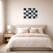 Unframed poster print of Wassily Kandinsky's Trente displayed on a wall in a bedroom