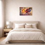 Gallery-wrapped canvas print of Wassily Kandinsky's Yellow Red Blue displayed on a wall in a bedroom