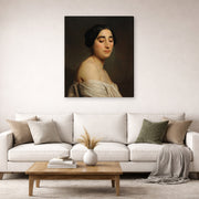 Gallery-wrapped canvas print of William-Adolphe Bouguereau's Disdain displayed on a wall in a second living room setting