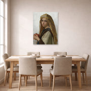Unframed poster print of William-Adolphe Bouguereau's Girl with a Pomegranate displayed on a wall in a dining room