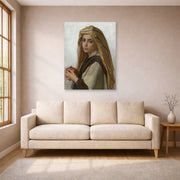 Unframed poster print of William-Adolphe Bouguereau's Girl with a Pomegranate displayed on a wall in a living room