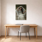 Unframed poster print of William-Adolphe Bouguereau's Le Voile displayed on a wall in a office