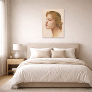 Unframed poster print of William-Adolphe Bouguereau's Study of a Woman's Head displayed on a wall in a bedroom