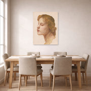 Unframed poster print of William-Adolphe Bouguereau's Study of a Woman's Head displayed on a wall in a dining room