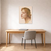 Unframed poster print of William-Adolphe Bouguereau's Study of a Woman's Head displayed on a wall in a office