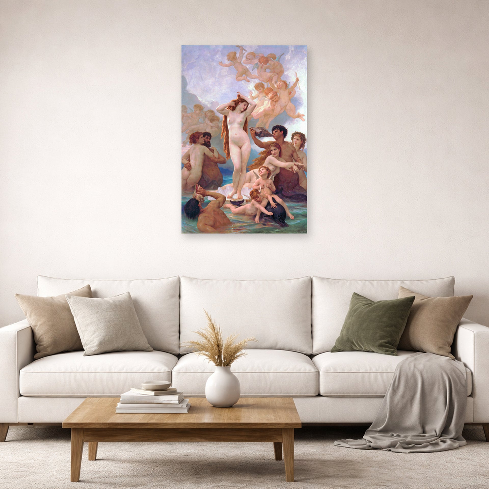 Unframed poster print of William-Adolphe Bouguereau's The Birth of Venus displayed on a wall in a second living room setting