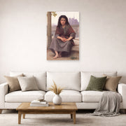 Unframed poster print of William-Adolphe Bouguereau's The Bohemian displayed on a wall in a second living room setting