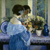 Frederick Carl Frieseke - Girl in Blue Arranging Flowers